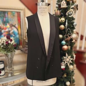 Black Topshop sleeveless long lapel vest
Size us 6